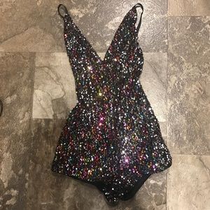 Sparkly, rainbow, backless romper!